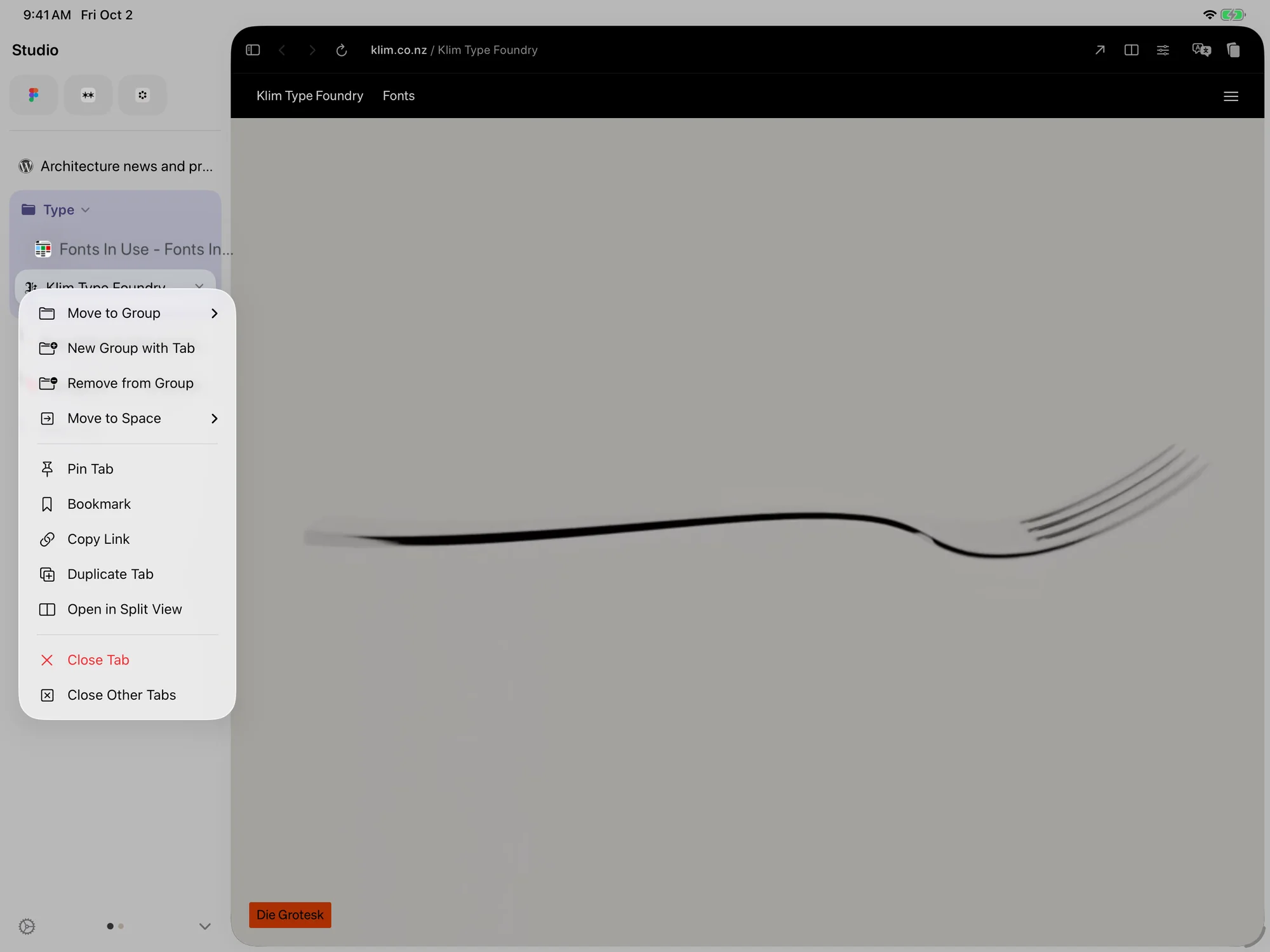Control-click or touch and hold a tab, then choose New Group with Tab.